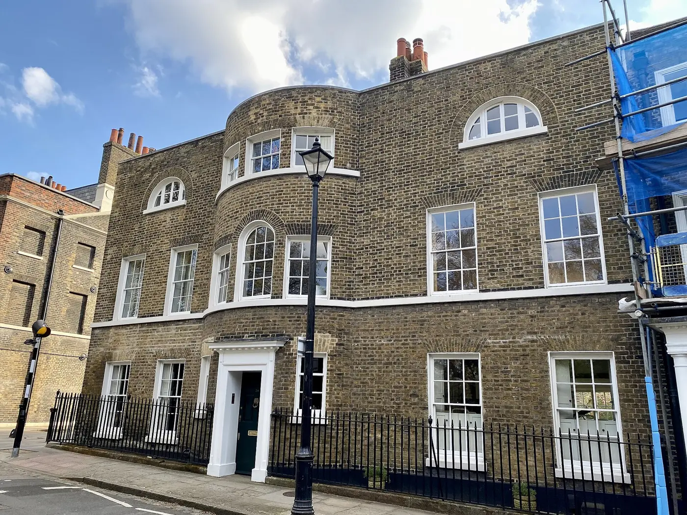 Georgian brick townhouse with sash windows on Crooms Hill, Greenwich